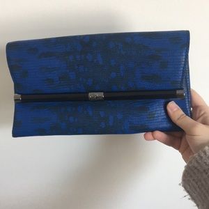 Fold over envelope clutch